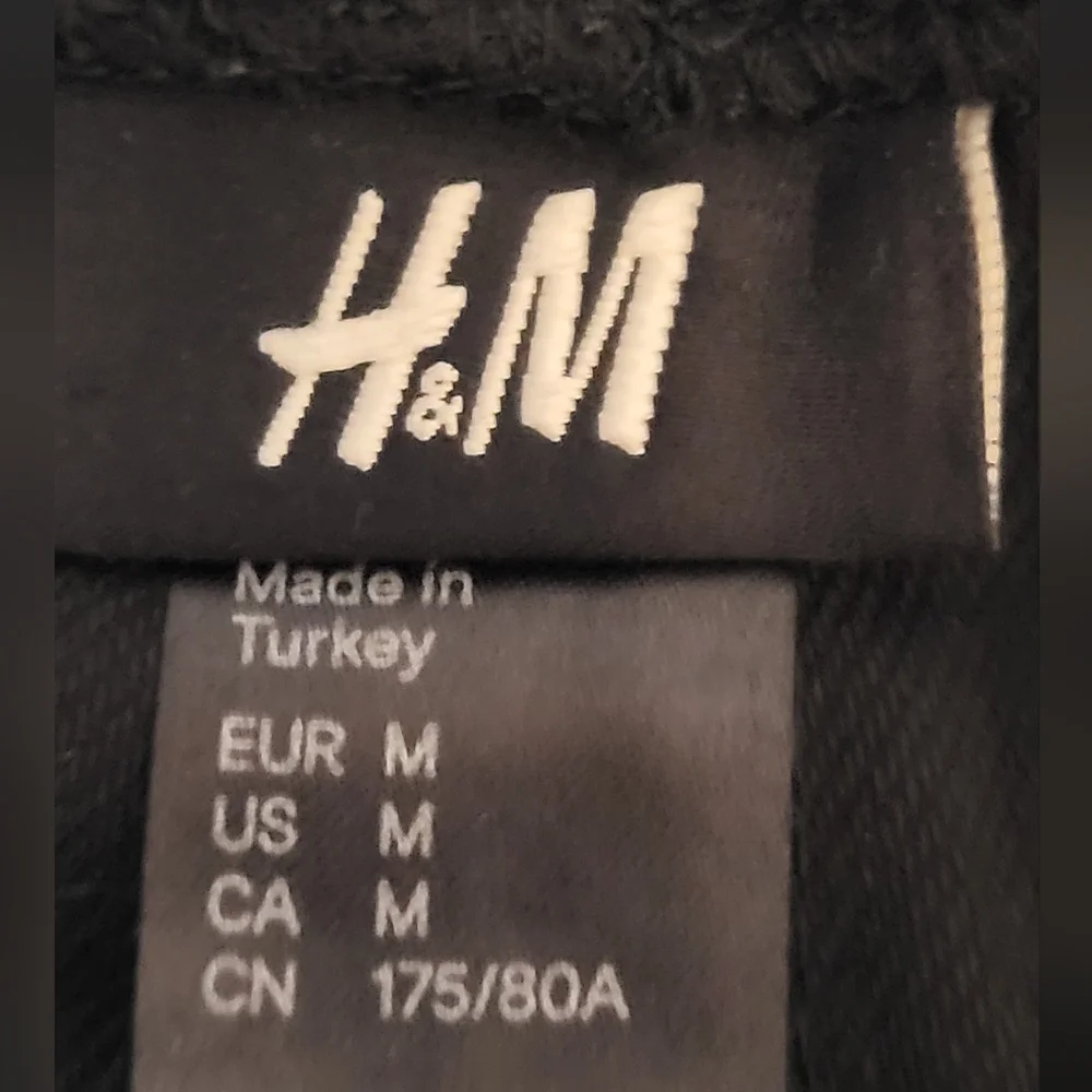 H&M Black Leggings with Gold Zip-Hem Detail - Size M